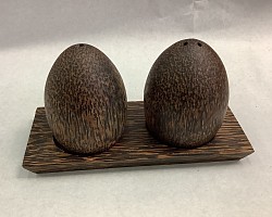 Item # PSP-3  Egg shape Palmwood salt and pepper set. The color and texture of the wood will vary some.