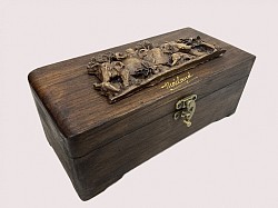 TB-25 R  Hinged Lid wooden box with Resin Elephant and a latch on the front. The Resin designs as well as color and the texture of the wood can vary some.  4'' x 8'' in size