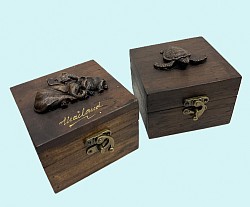 Item # TB-50 R Hinged lid box with resin on top and a metal latch on the front. The sizing on the box is @ 10 cm x 10 cm ( 4'' x 4''). The Style of the resin Elephant or Turtle can vary some - unless ordered be style- Also the color and Texture of the wood can vary some.