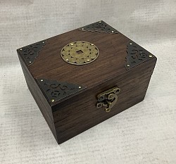 Item # TB-51 Z   Hinged top box with coroner metal accents and a Zodiac coin.  Also comes with a nice metal latch on the front. The Box sizing is @ 10cm x 12.5 cm ( 4'' x 5''). The  color and texture of the wood can vary.