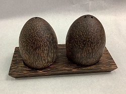 Item # PSP-3  Egg shape Palmwood salt and pepper set. The color and texture of the wood will vary some.