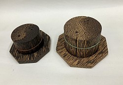 Item # SPS-6  Yin-Yang Style salt and pepper shaker sets.  please not that this styles is available  in 2 sizes. the small size is @ 5.5 cm x 9 cm and the large is @ 7 cm x 10 cm. The color and the texture of the wood can vary some.