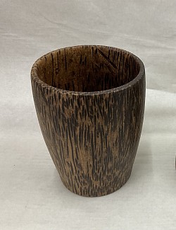 Item # PWC-9   Palmwood cup @ 8cm x 11cm in size. The sizing, Color and textue of the wood can vary some.